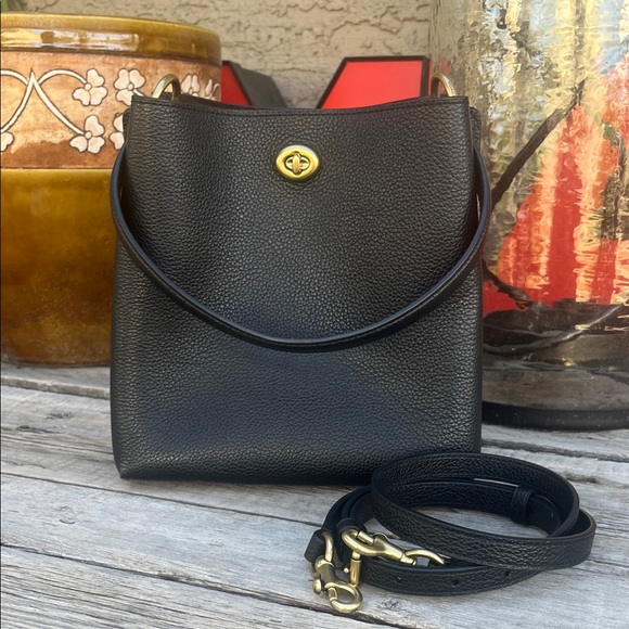 Coach Handbags - Classic Black Coach Leather Shoulder bucket  Bag with Gold Hardware. Like new.